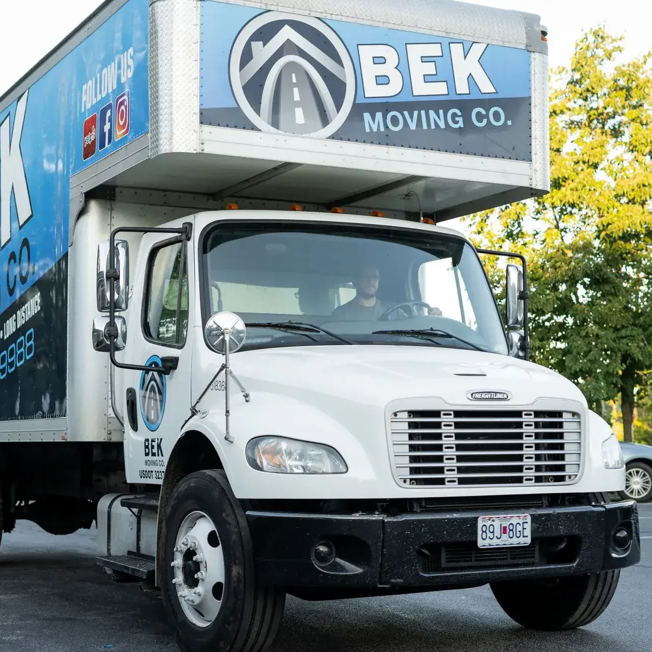 BEK Moving Co. truck parked on street